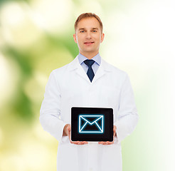 Image showing smiling male doctor with tablet pc