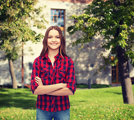 Image showing smiling young woman in casual clothes