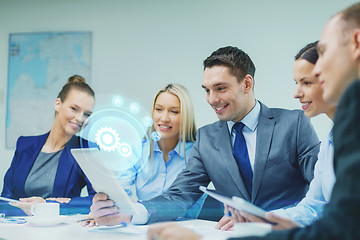 Image showing business team with tablet pc having discussion