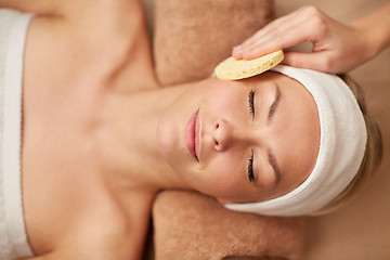 Image showing close up of woman having face cleaning in spa