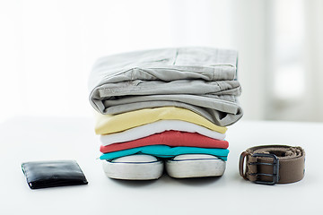 Image showing close up of clothes and accessories on table