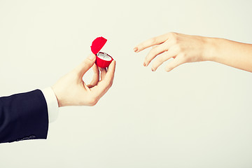 Image showing couple with wedding ring and gift box