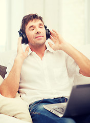 Image showing man with headphones listening to music