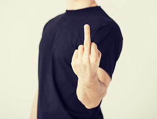 Image showing man showing middle finger