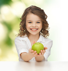 Image showing happy girl with green apple 