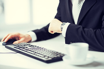 Image showing man hands typing on keyboard