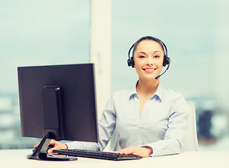 Image showing friendly female helpline operator