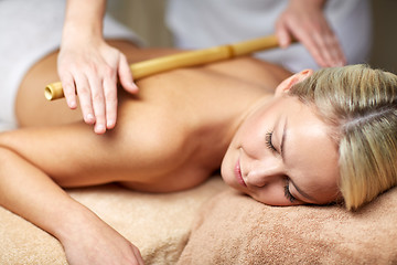 Image showing close up of woman lying and having massage in spa