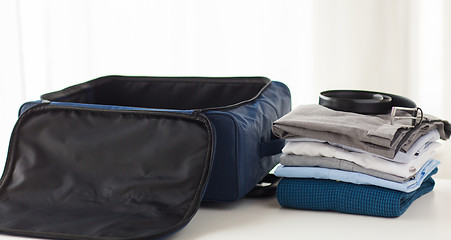 Image showing close up of business travel bag and clothes