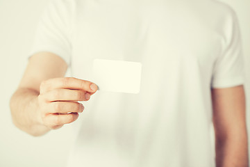 Image showing man hand with blank paper