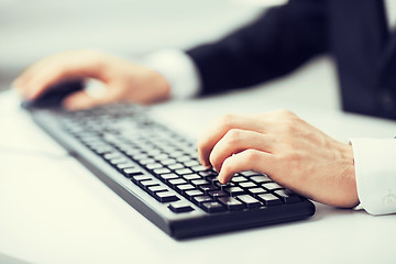 Image showing man hands typing on keyboard