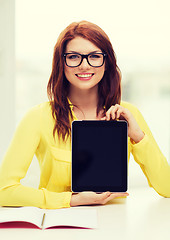 Image showing smiling student girl in eyelgasses with tablet pc