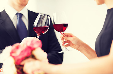 Image showing engaged couple with wine glasses