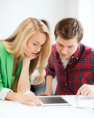 Image showing students looking at tablet pc at school