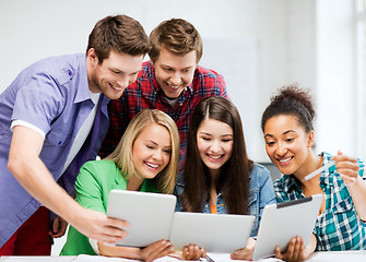 Image showing students looking at tablet pc in lecture at school