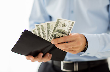 Image showing close up of businessman hands holding money