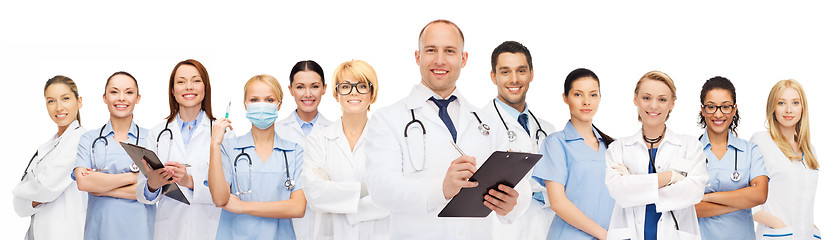 Image showing group of smiling doctors with clipboard