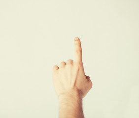 Image showing man hand pointing at something