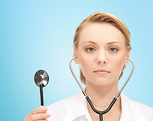 Image showing young female doctor with stethoscope