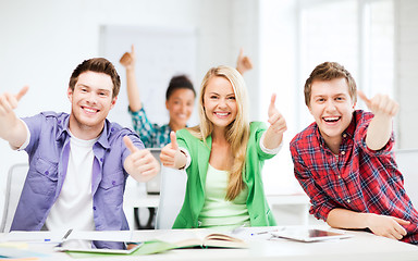 Image showing students showing thumbs up at school