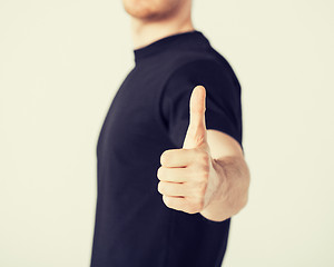 Image showing man showing thumbs up