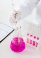 Image showing close up of scientist making test in lab