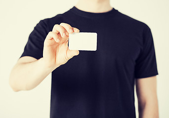 Image showing man hand with blank paper