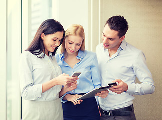 Image showing business team working with tablet pcs in office