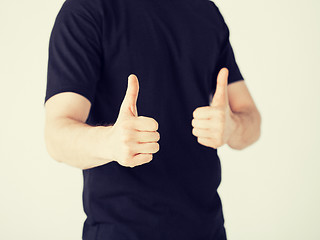 Image showing man showing thumbs up