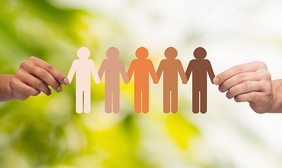 Image showing hands holding paper chain multiracial people