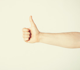 Image showing man showing thumbs up