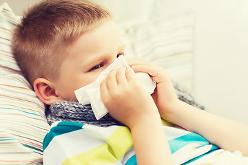 Image showing ill boy with flu at home