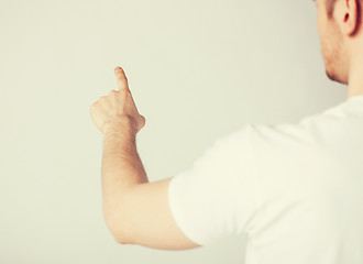 Image showing man hand pointing at something
