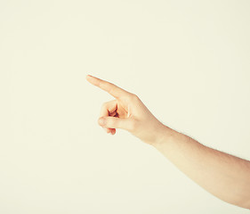 Image showing man hand pointing at something