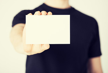 Image showing man hand with blank paper