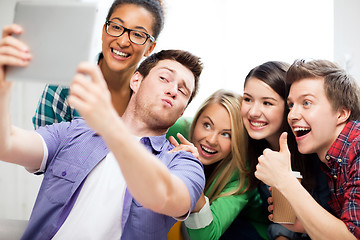 Image showing students taking selfie with tablet pc at school