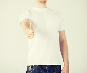 Image showing man showing thumbs up