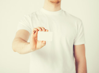 Image showing man hand with blank paper