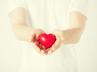 Image showing man hands with heart