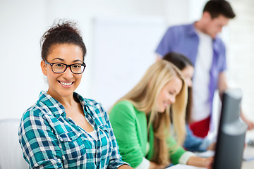 Image showing student with computer studying at school