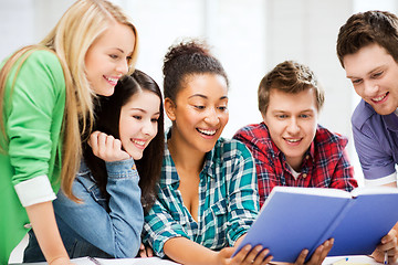 Image showing students reading book at school