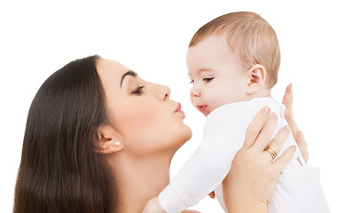 Image showing mother kissing her baby