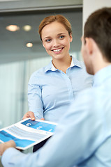 Image showing group of smiling businesspeople meeting in office