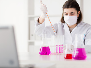 Image showing close up of scientist making test in lab