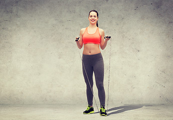 Image showing sporty woman with skipping rope