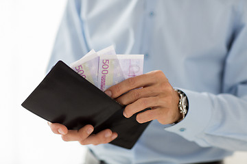 Image showing close up of businessman hands holding money