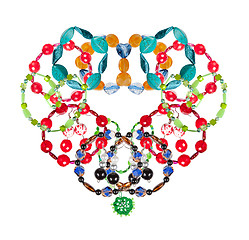Image showing Set of bracelets have been laid out in a heart-shaped. collage