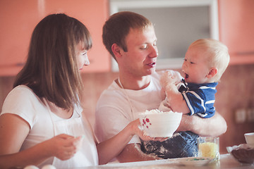 Image showing Happy family cooking at kitchen