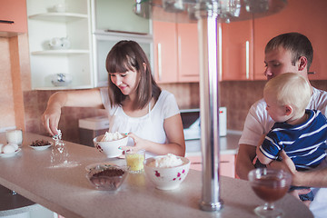 Image showing Happy family cooking at kitchen