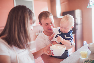 Image showing Happy family cooking at kitchen